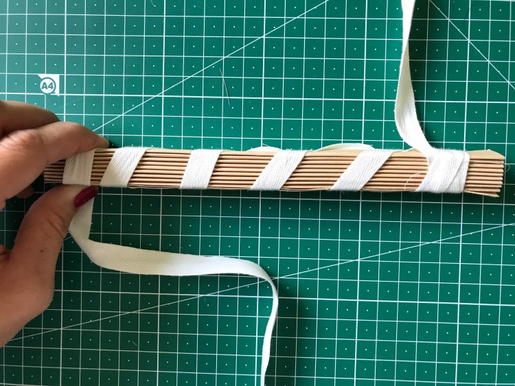 Accordion pleating moulds with fabric in between wrapped with a cotton twill tape.