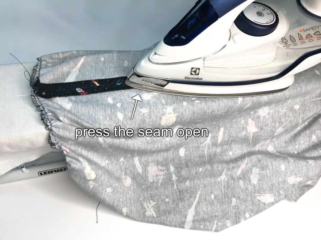 Pressing a skirt side seam open.