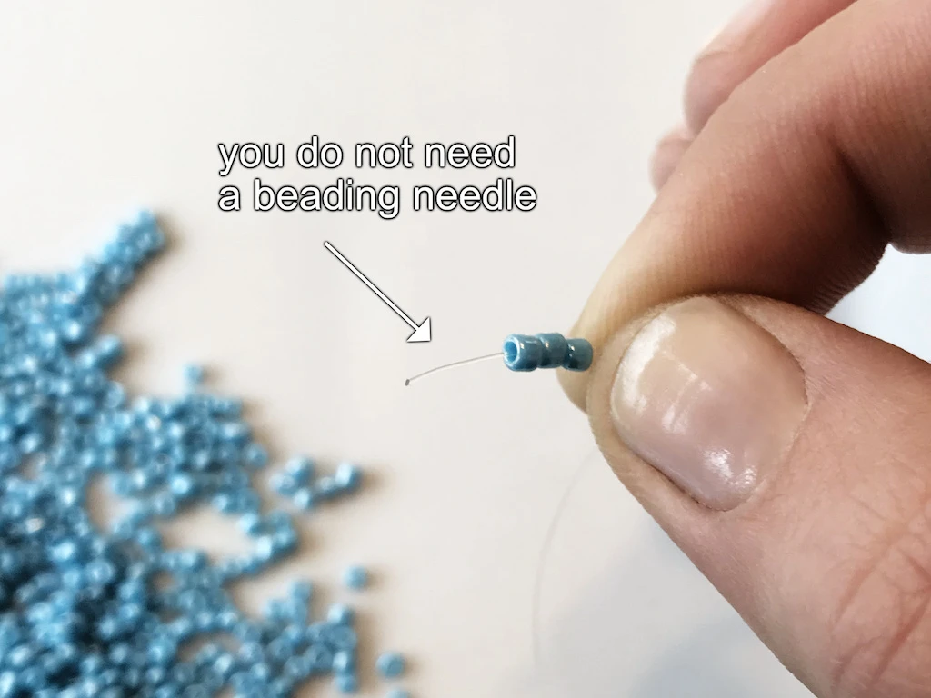 Picking beads using nylon cord.