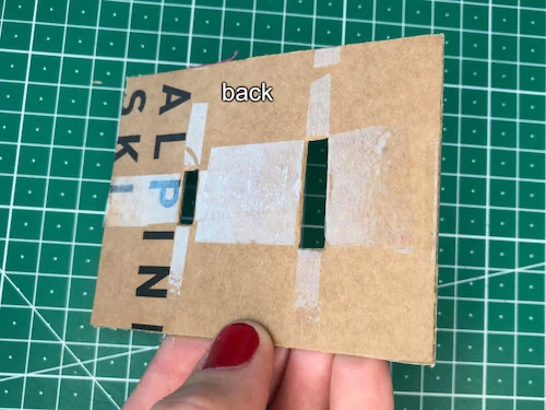 Coating cardboard bias binding tape maker with adhesive tape.