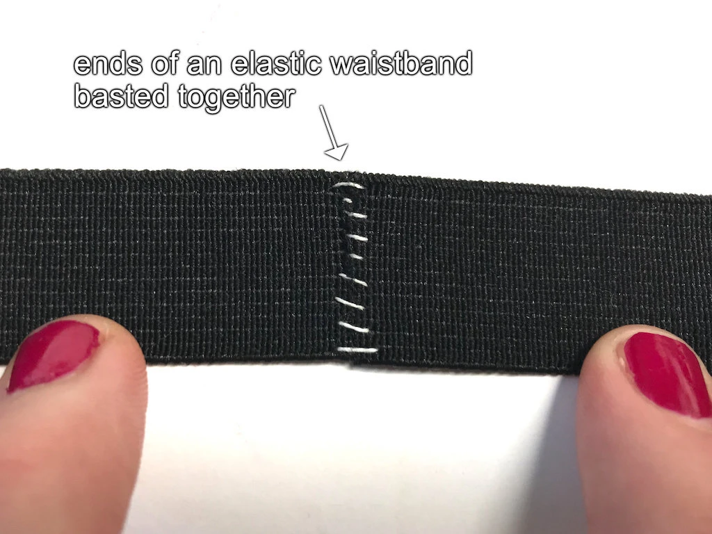 Ends of elastic waistband basted together.