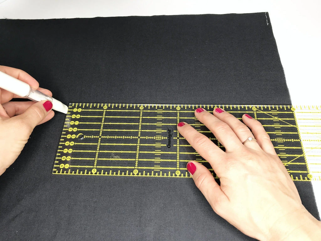 Exactly measuring from the lengthwise edge of the fabric before transferring pattern pieces.
