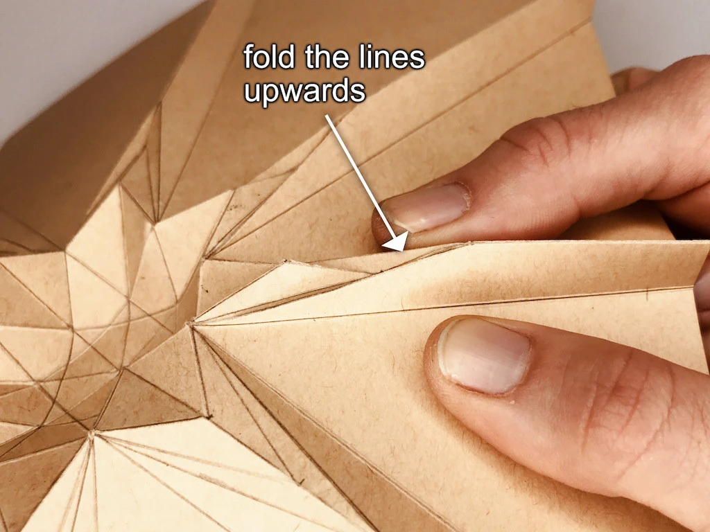 Folding outer star upwards.