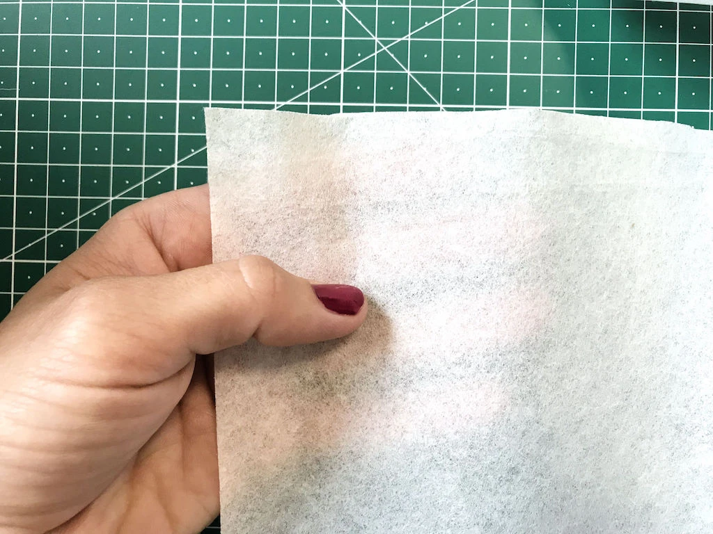 Pleated pink chiffon fabric. Knife pleats.