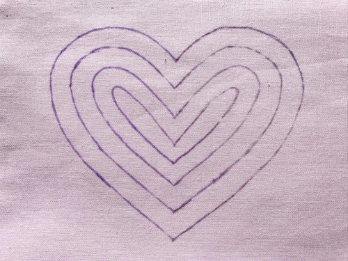 Heart template transferred to cotton fabric.
