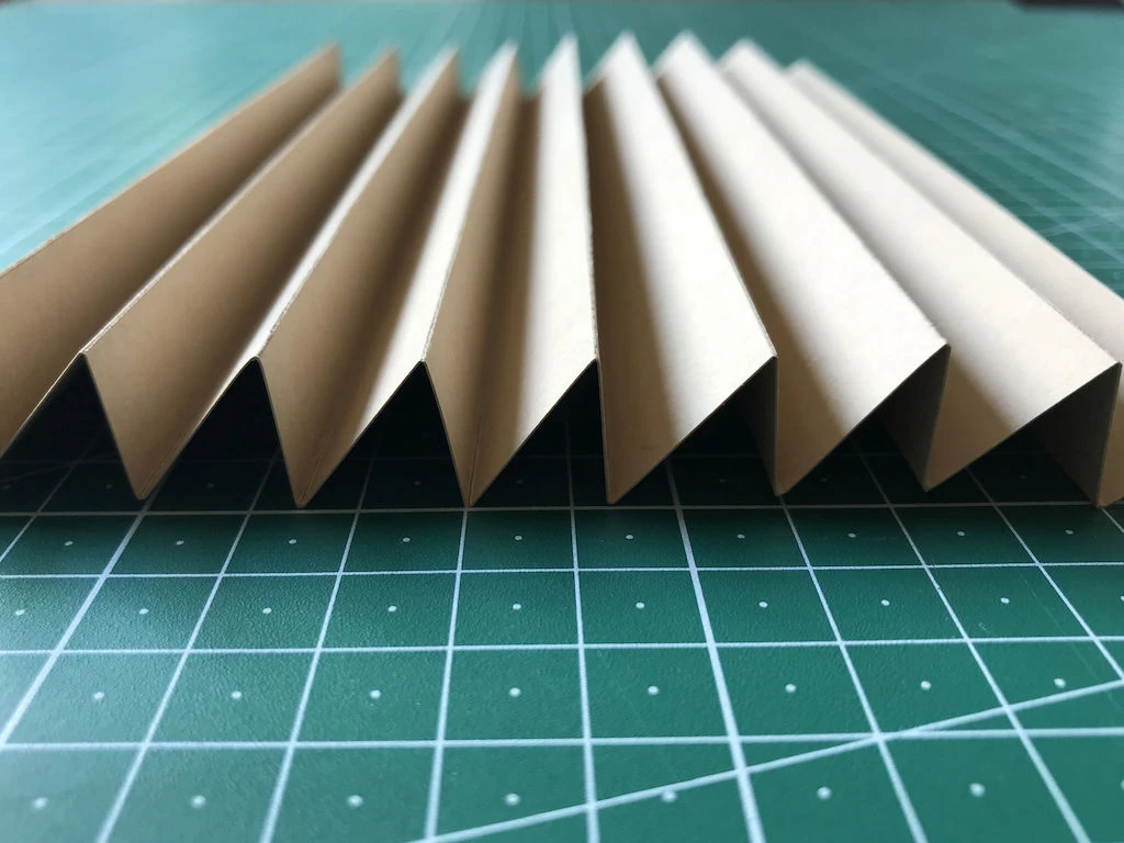 Final shape of mould for permanent knife pleats.
