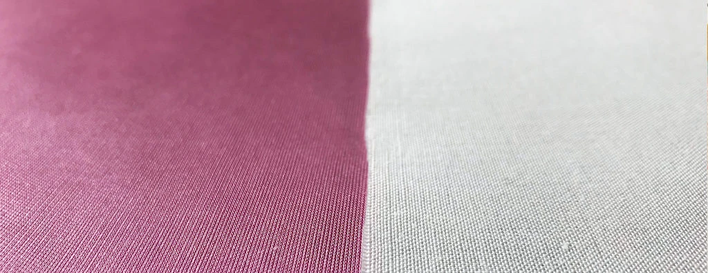 Pink knit polyester lining fabric and plain weave cotton fabric that can be used as a lining.