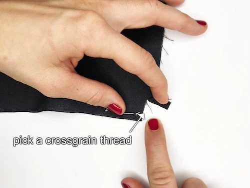 Clipping into the fabric along the crossgrain.
