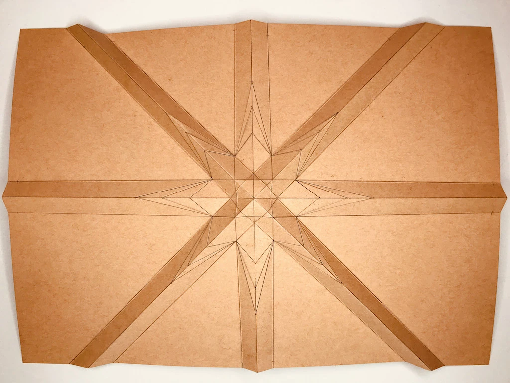 Folded horizontal, vertical and diagonal lines.
