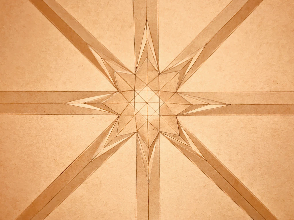 Folding outer star upwards.