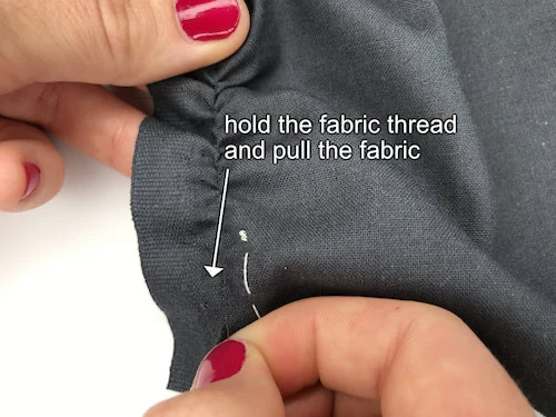 Pull the fabric along the picked thread.
