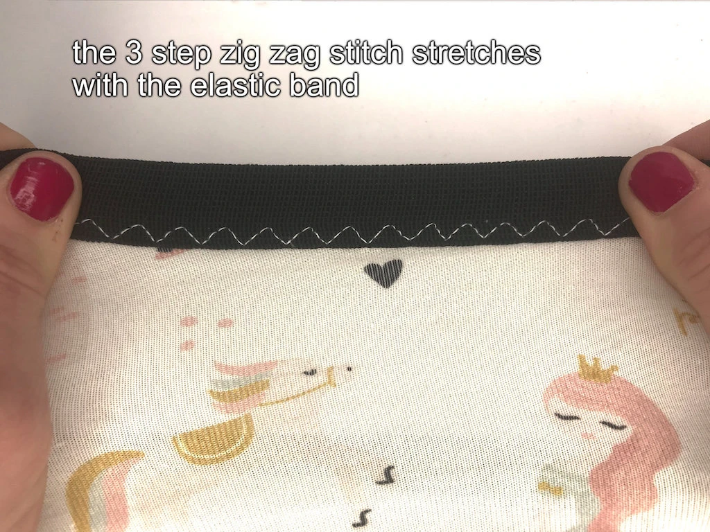 Stretched elastic waistband sewn to leggings at waist with a 3 step zigzag stitch.