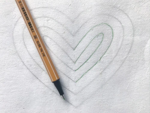 Transferring a heart temple to stabiliser with a sharpie.