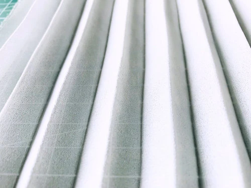 Hand pleated georgette fabric after being wrinkled and washed.