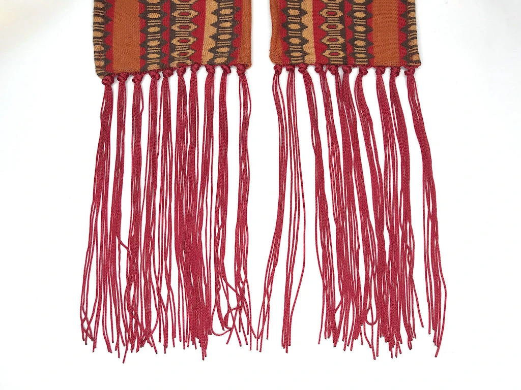 Fringe trim divided into chunks of six fringe strings made for decoration.