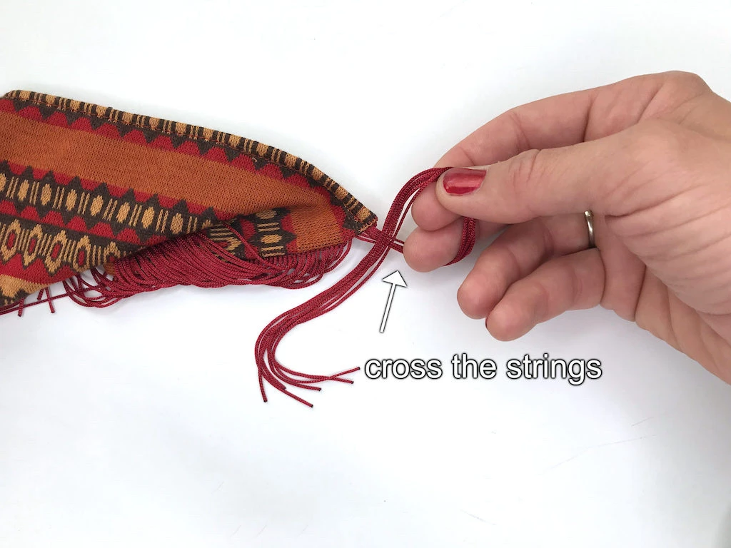 Crossing a chunk of 6 fringe strings.
