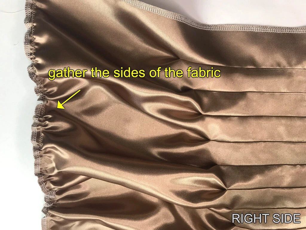 Gathered sam allowance of the beige skirt.