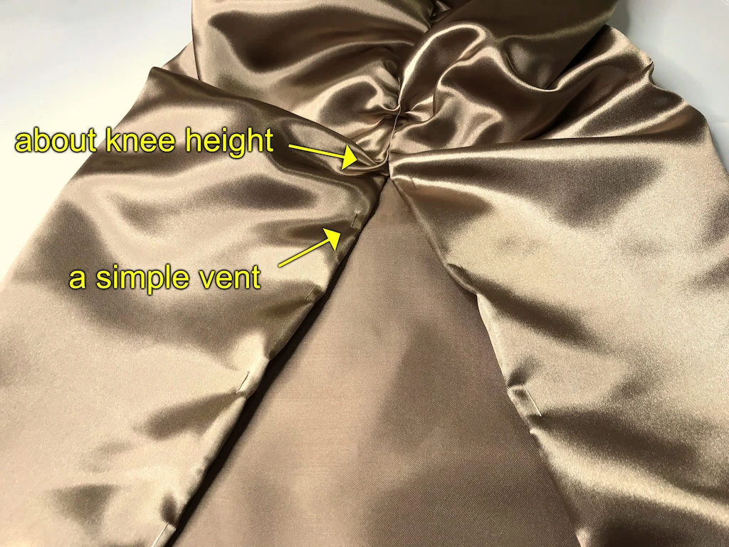 A simple vent on a Narcissa Malfoy beige satin dress.