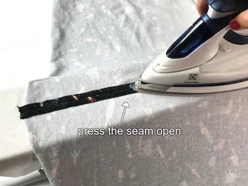 Pressing a skirt side seam open.