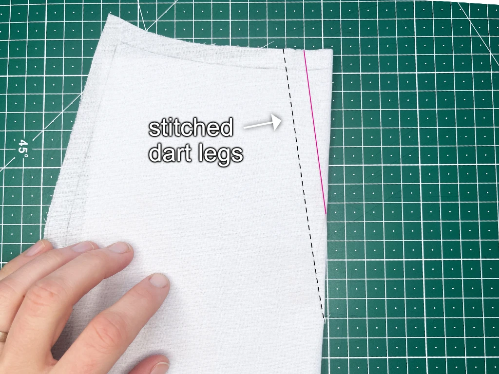 Dart legs stitched together along the traced lines.